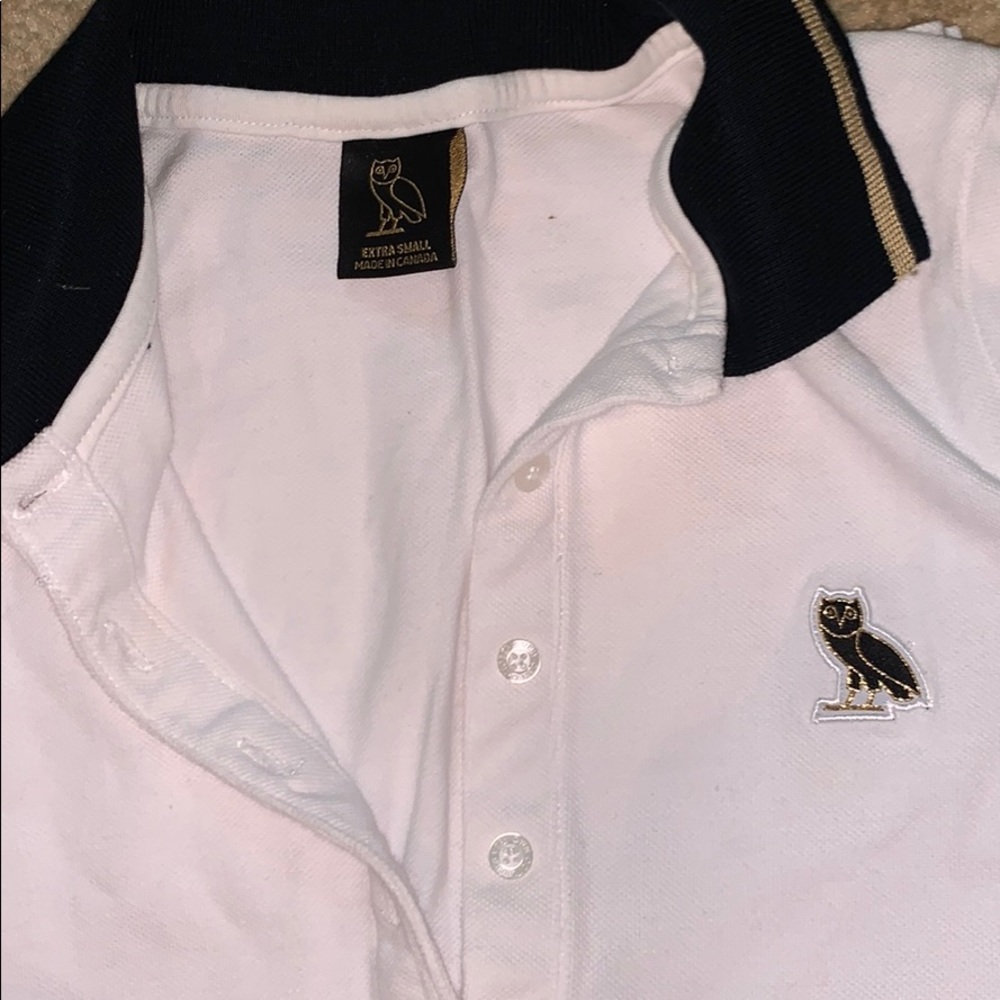 Women’s owl patch polo